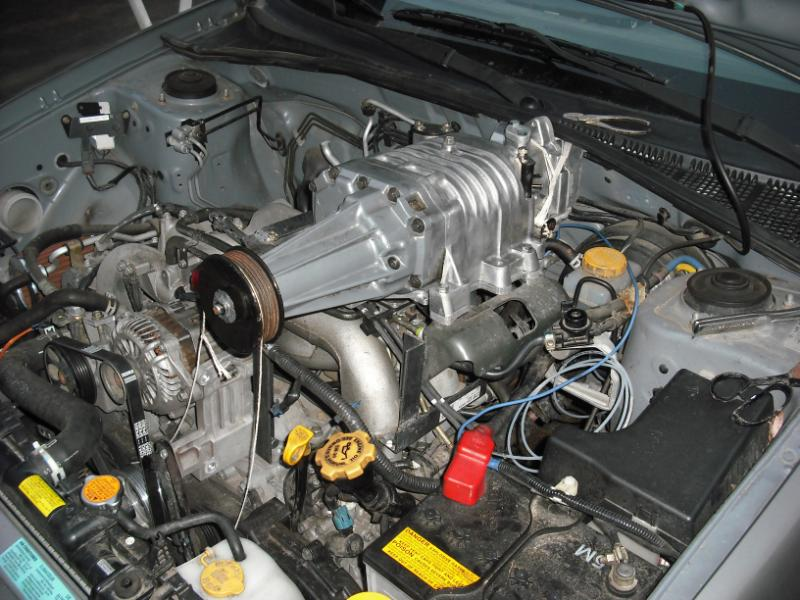 Illustration for article titled Garage Mechanic Ghetto-Rigs Subaru Impreza With Eaton Supercharger